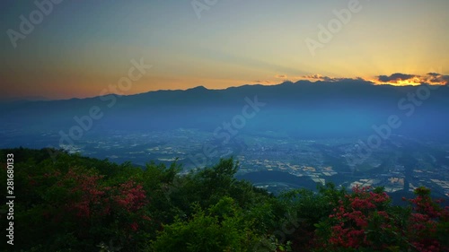 Panning shot of Central Alps and azaleas at sunset,  Japan photo