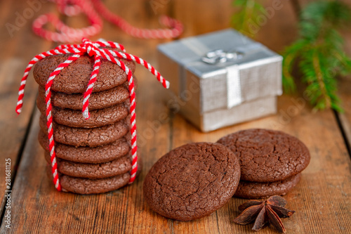 Chocolate biscuits, gift, star anise and Christmas tree branches