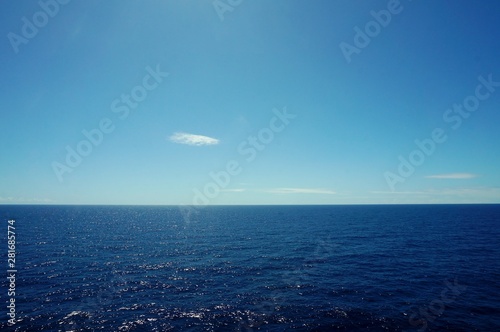 sea and blue sky and clouds