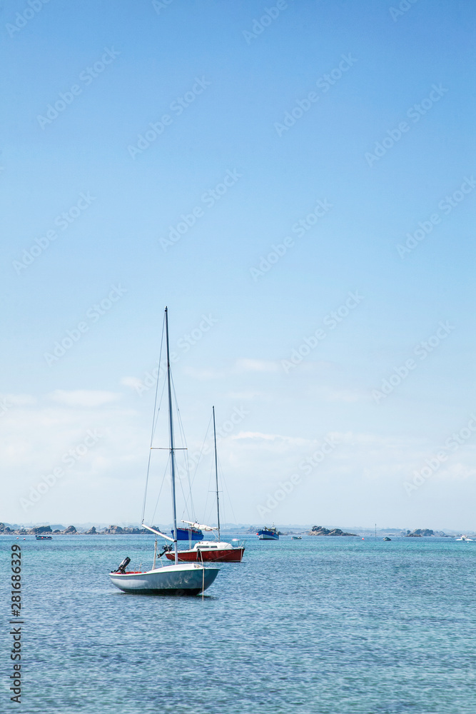 Ship in the ocean near the coast of french Brittany, Ile de Batz Ship in the ocean near the coast of french Brittany, Ile de Batz