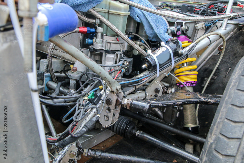 A detail of the sports car engine. It is a historic group B rallye car from the past. 