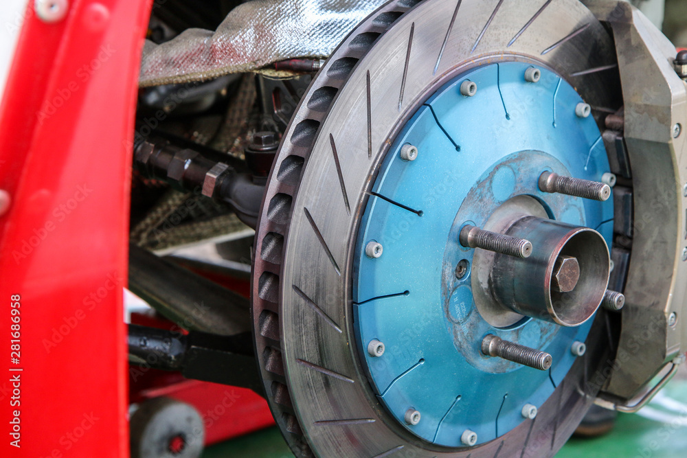 A detail of the sports car brakes. It is a historic rallye car from the past. 