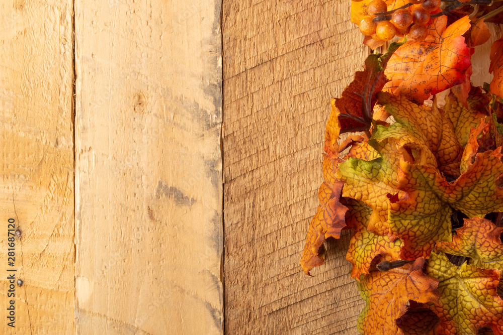 Autumn composition with dry leaves on a wooden table. View from above. Copy space. Autumn mood Autumn composition with dry leaves on a wooden table. View from above. Copy space. Autumn mood