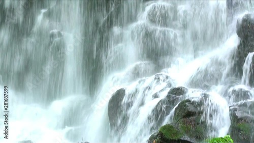 Slow motion view of waterfall photo