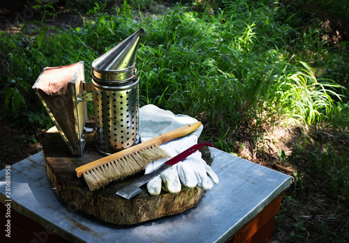 beekeeping background smoker and gloves