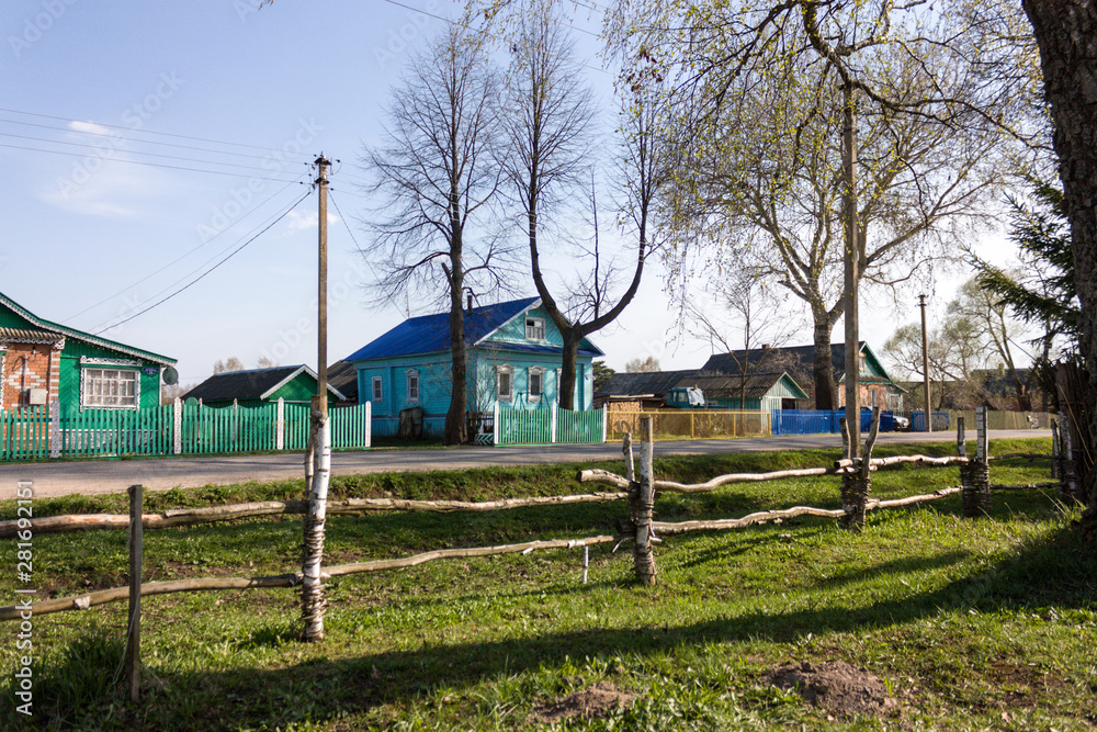 wooden fence and wooden house in russian village Martynovo, Yaroslavl region