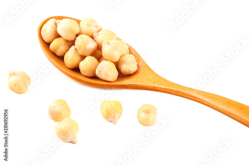 chickpeas in wooden spoon isolated on white background