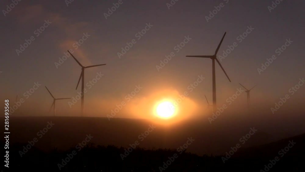 View of sunrise and wind turbines, Wakkanai, Hokkaido, Japan View of sunrise and wind turbines, Wakkanai, Hokkaido, Japan