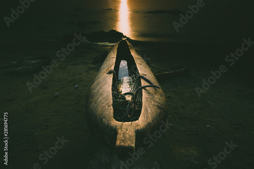 dugout fishermen canoe at the Beach, sunrise on Lake Malawi, South-East-Africa