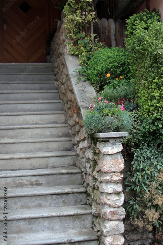 old stone staircase surrounded by green plants old stone staircase surrounded by green plants