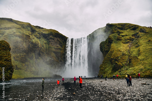 Beautiful scenery of the majestic Skogafoss Waterfall in countryside of Iceland in summer.  photo