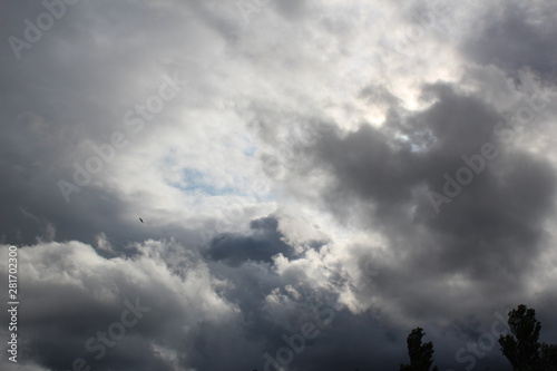 dramatic sky with clouds and sun