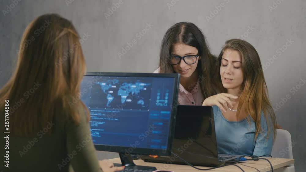 Start-up young women in office, co-working area. Start-up young women in office, co-working area.
