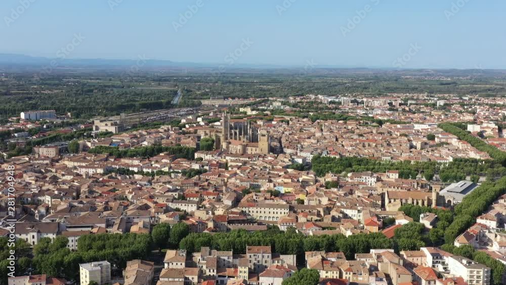 aerial flight towards Narbonne Cathedral Aude Occitanie France