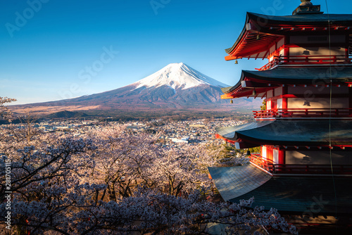 Fujiyoshida, Japan at Chureito Pagoda and Mt. Fuji in the spring with cherry blossoms full bloom during sunrise. Travel and Vacation concept.