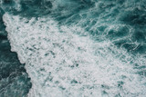 Pattern of ocean, sea waves, splashes and sea foam background