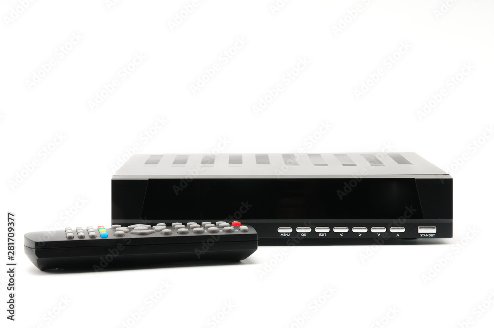 Digital TV tuner with remote control on white background Digital TV tuner with remote control on white background