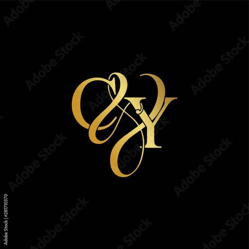 Initial letter C & Y CY luxury art vector mark logo, gold color on black background. photo