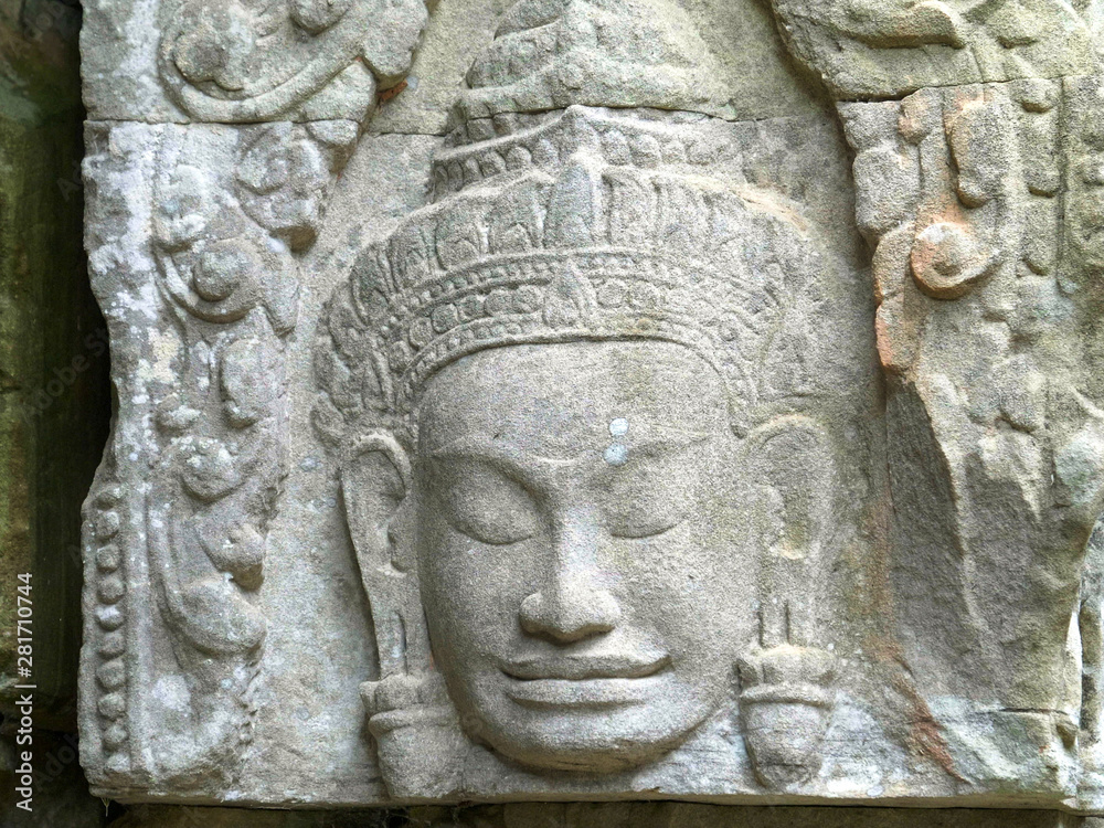 a carved face at preah khan temple