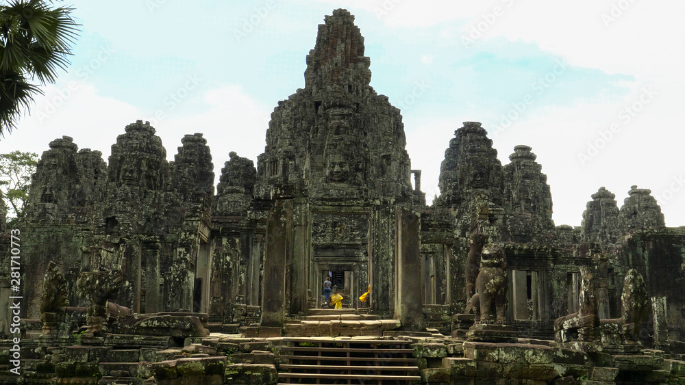 wide shot of face towers and the entrance to bayon temple