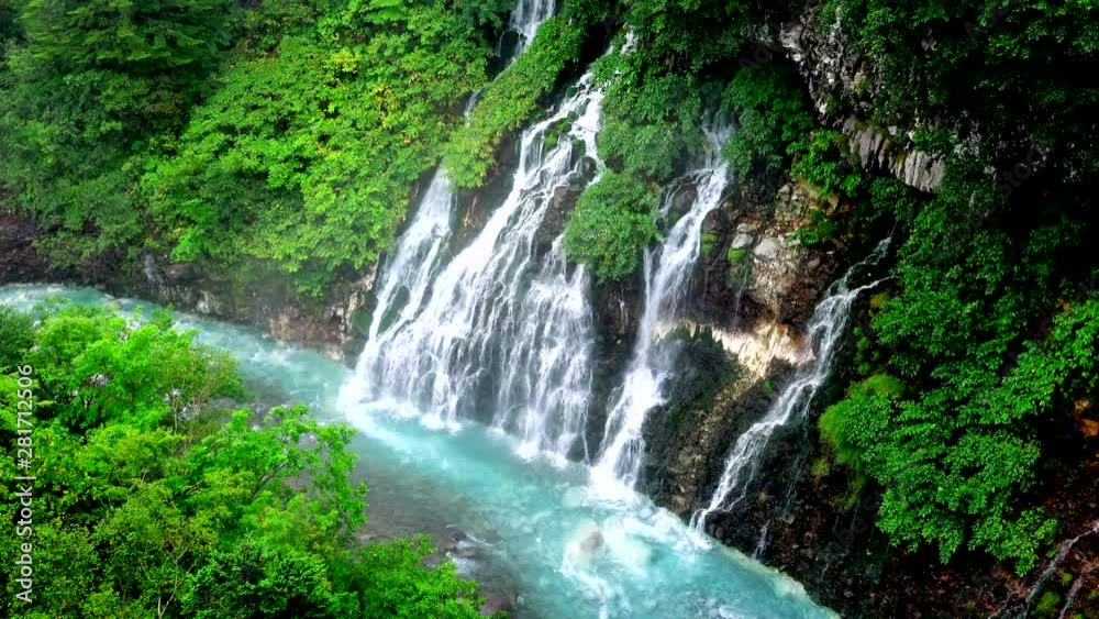 High angle view of Whitebeard Falls and Biei River, Japan High angle view of Whitebeard Falls and Biei River, Japan