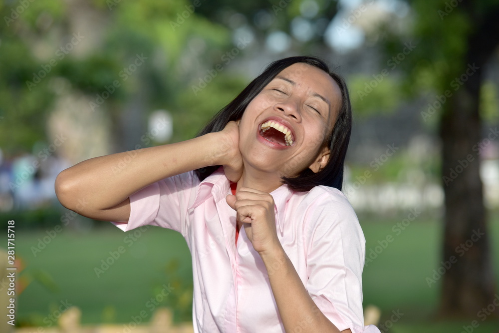 A Filipina Female Laughing