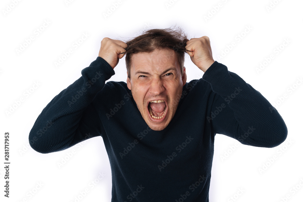 emotional portrait of a crazy man in close-up. concept: the nervous breakdown, mental disease, headaches and migraine. isolated on white background. emotional portrait of a crazy man in close-up. concept: the nervous breakdown, mental disease, headaches and migraine. isolated on white background.