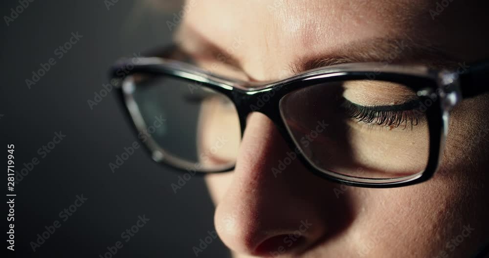 Executive Wearing Glasses While Surfing Internet