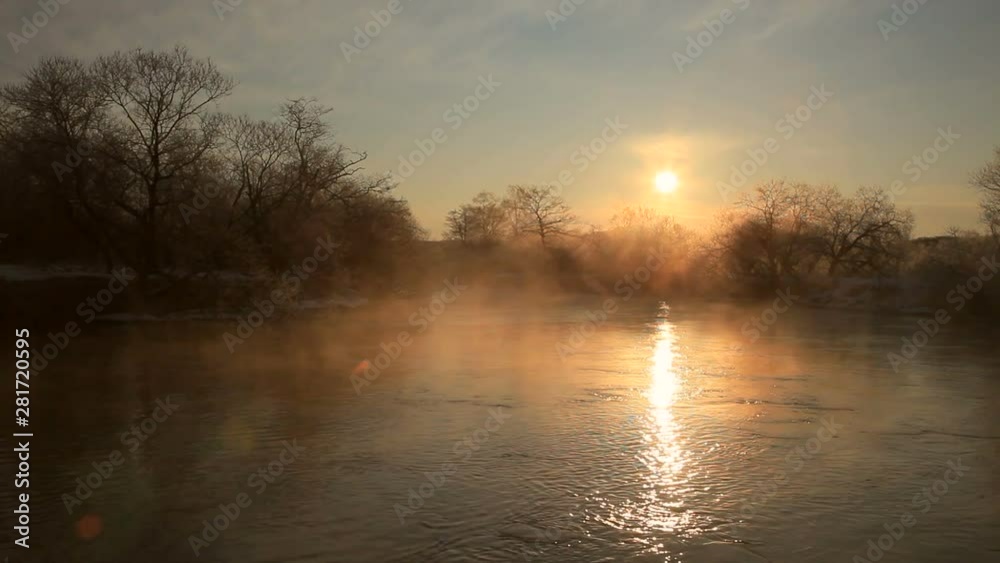 Kushiro River in fog at sunrise, Shibecha, Hokkaido, Japan Kushiro River in fog at sunrise, Shibecha, Hokkaido, Japan