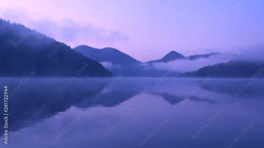 Lake Shikaribetsu in fog at sunrise, Shikaoi, Hokkaido, Japan Lake Shikaribetsu in fog at sunrise, Shikaoi, Hokkaido, Japan