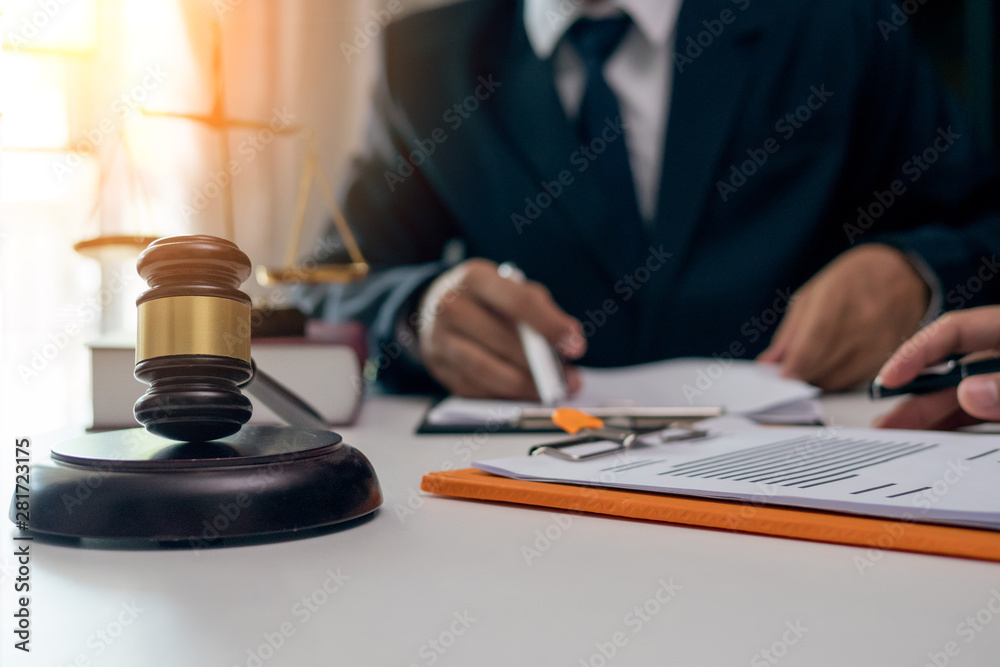 businessman writing on a paper