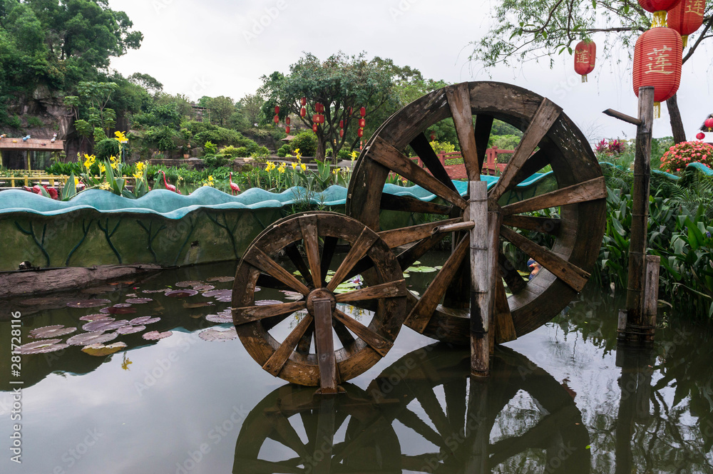 Two wooden wheels in Guangzhou Panyu Lotus Hill Scenic Area, China Two wooden wheels in Guangzhou Panyu Lotus Hill Scenic Area, China