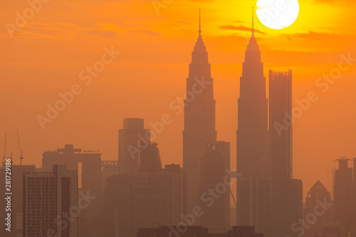 Photography KUALA LUMPUR, MALAYSIA - 30th JULY 2019; Cloudy sunset view over down town Kuala Lumpur