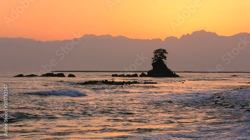 Amaharashi Beach and Meiwa at sunset, Takaoka, Toyama, Japan photo