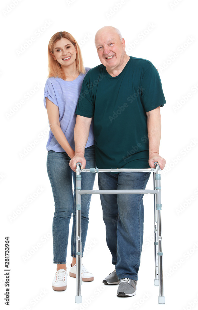Caretaker helping elderly man with walking frame on white background Caretaker helping elderly man with walking frame on white background