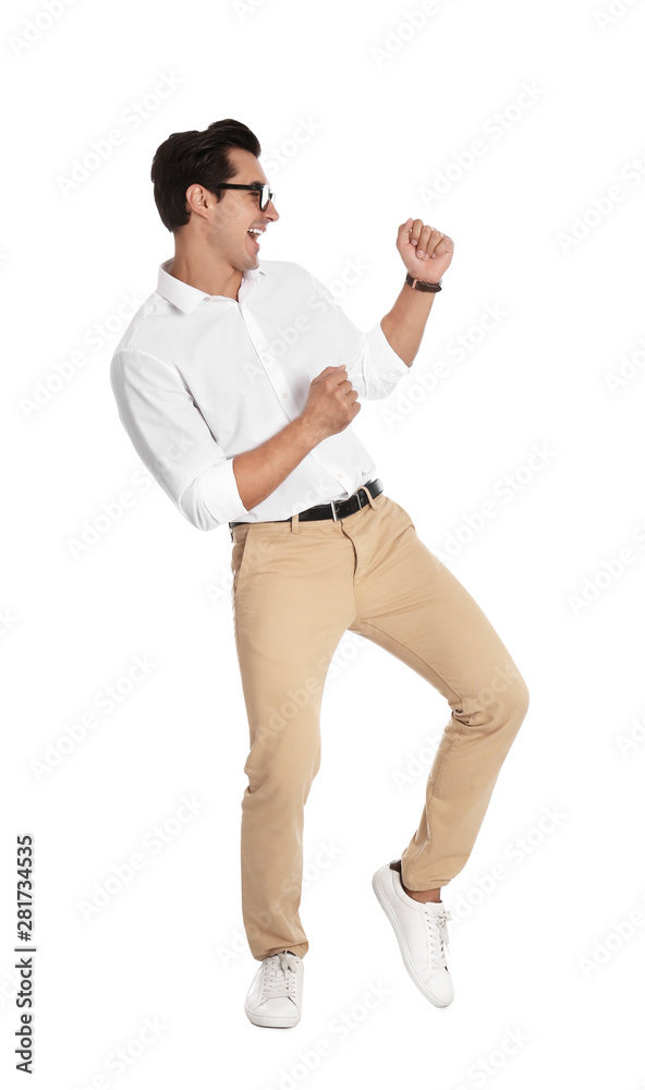 Handsome young man with glasses dancing on white background Handsome young man with glasses dancing on white background