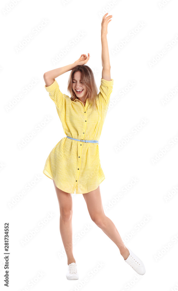 Beautiful young woman in yellow dress dancing on white background Beautiful young woman in yellow dress dancing on white background