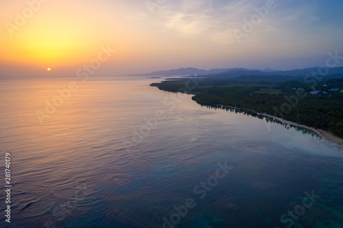 Aerial view of tropical beach at sunrise.Samana peninsula,Bahia Principe beach,Dominican Republic.