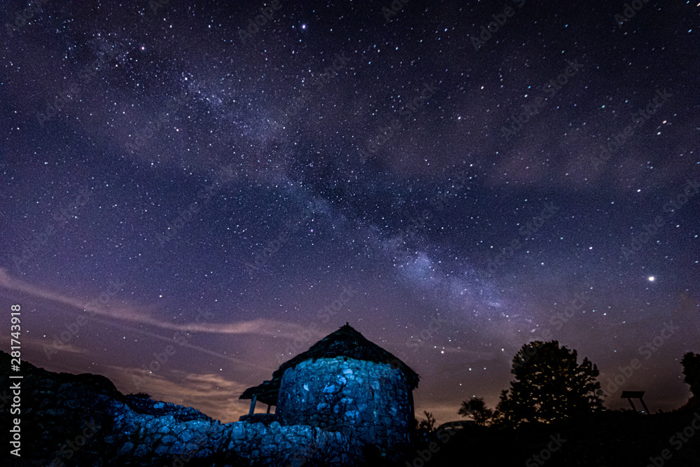 old house and milky way in the sky