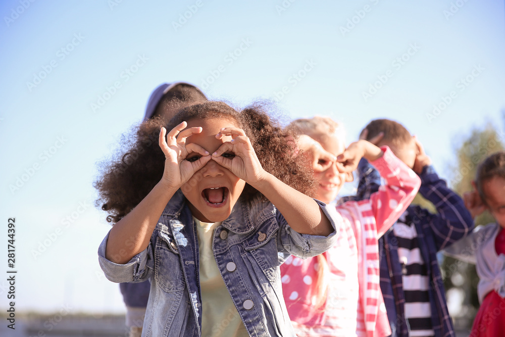 Group of happy children having fun outdoors Group of happy children having fun outdoors