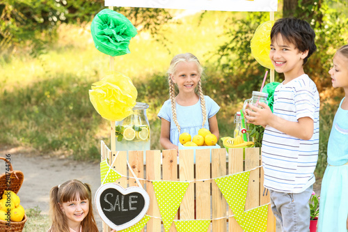 Cute little children sellin...