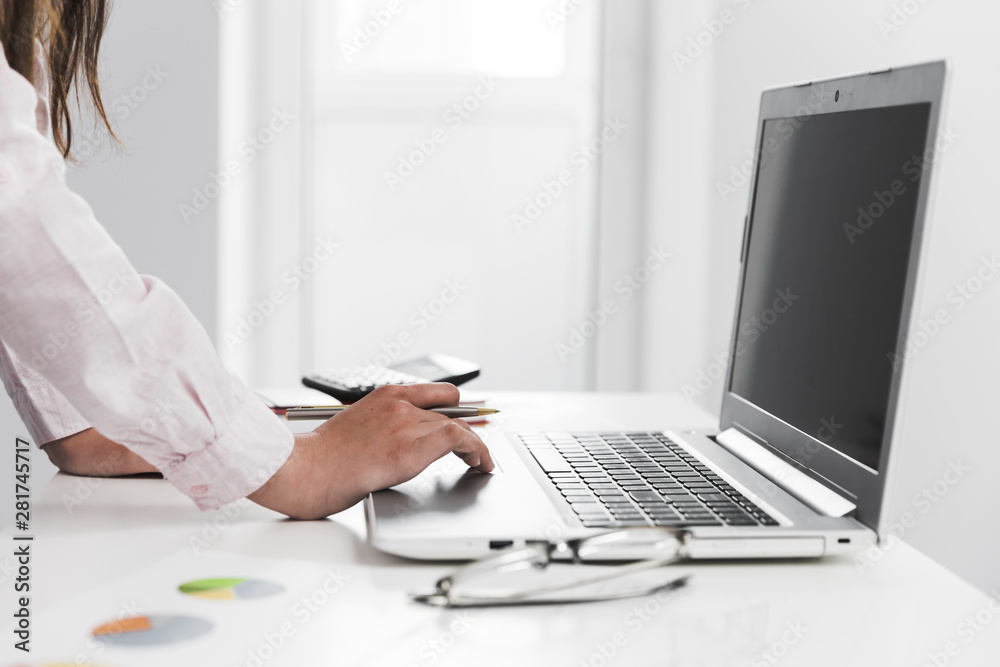 Fototapeta premium Business man working in a office desktop
