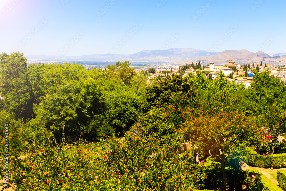 Beautiful Alhambra palace and surrounding mountains in Granada, Spain.