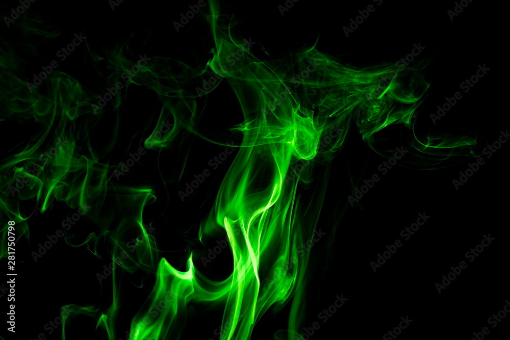Fototapeta premium Green smoke on black background