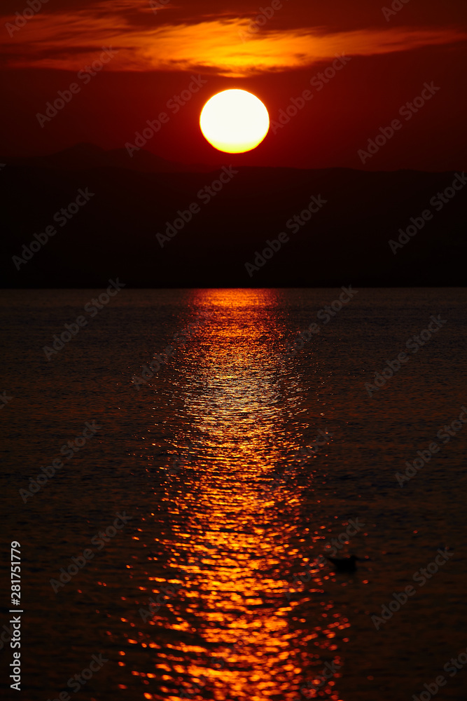 sunset with reflection vertical