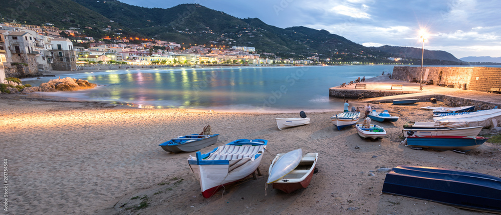 Obraz premium Panorama night shot of beautiful bay and fishing boats in Cefalu, Sicily, Italy