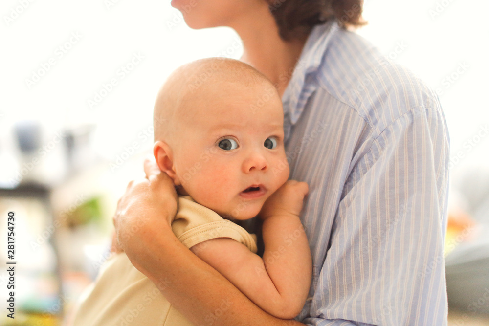 mom touches baby, mother holding child, embrace mom touches baby, mother holding child, embrace