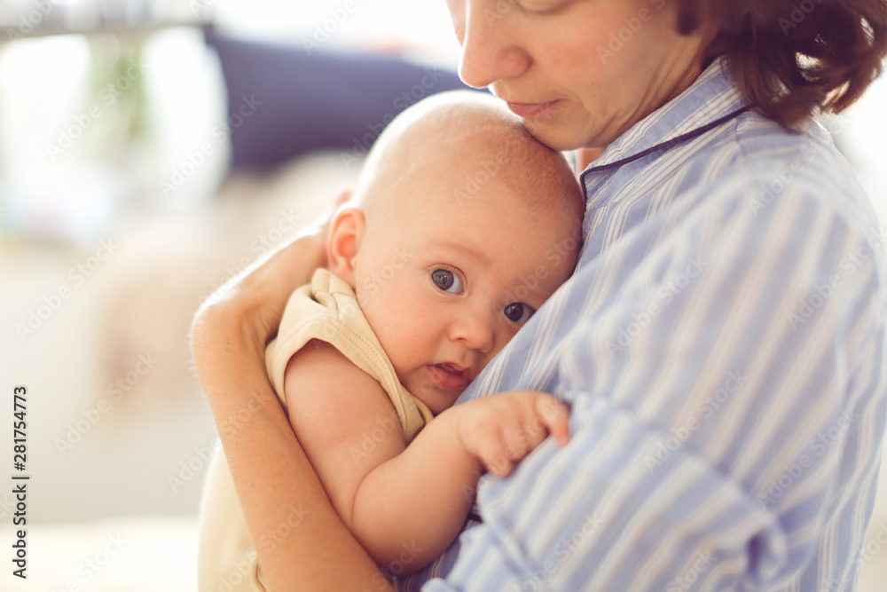 mom touches baby, mother holding child, embrace mom touches baby, mother holding child, embrace