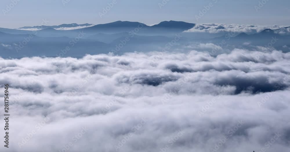 Mountains rising above fog, Koshimizu, Hokkaido, Japan Mountains rising above fog, Koshimizu, Hokkaido, Japan