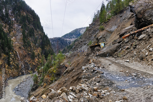 The road from Mestia to Zugdidi was blocked by a rockfall. Local Georgian road services are clearing the road. Samegrelo Zemo-Svaneti, Georgia.